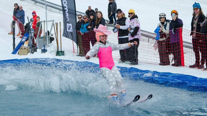 skier pond skimming in winter